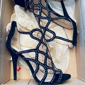 Heels worn only once.